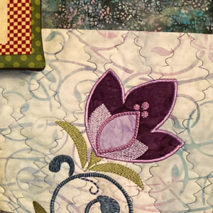 Table Runner with purple flowers, greens, and blues